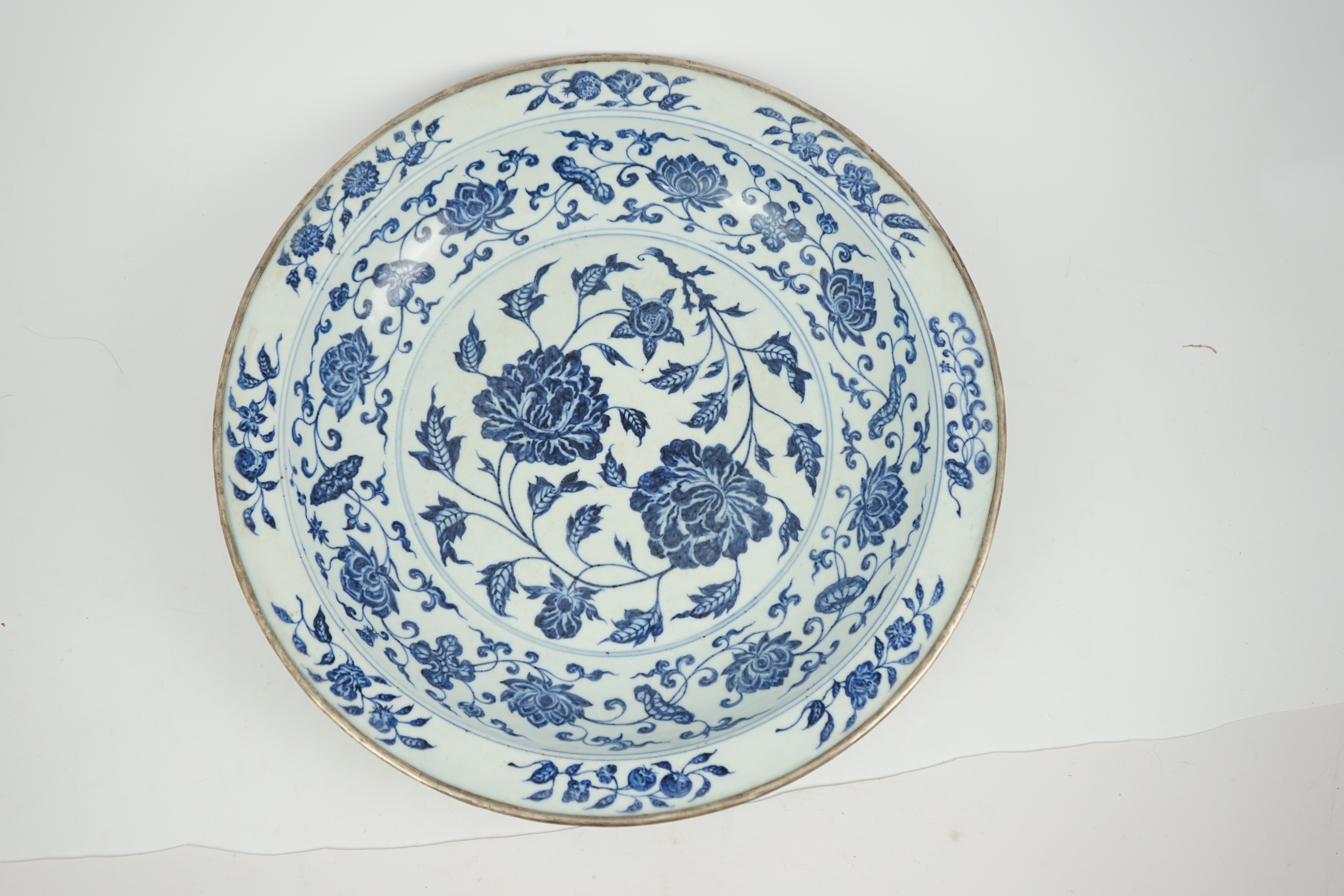 A large Chinese Ming style blue and white dish, possibly 18th century